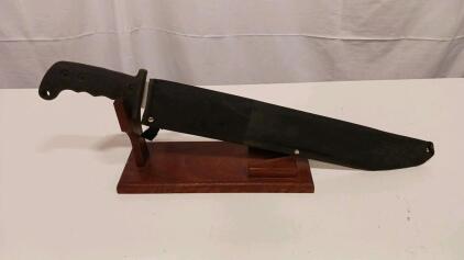 Ontario SP8 Style Survival Machete, 15" Sawback Blade, Black Kraton Handle, Nylon Sheath, Stand