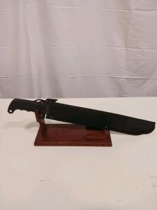 Large Sawback Survival Machete Knife, Black Polymer Handle, 12" Blade, Display Stand