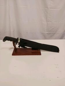 Survival Machete with Sawback Spine, 18" Blade, Synthetic Handle, Includes Sheath and Display Stand