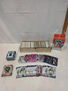 Approx. 200+ Assorted Basball, Football And Basketball Cards Including Theo Johnson And Jalen Brunson