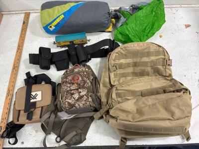 Mountain Smith Morrison 2 person 3 season tent,Black Hawk Utility belt with pouches, Vortex Binoculars bag, and assorted other bags. Vintage toy train car