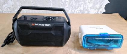 (1) Monster Nomad Portable Indoor/Outdoor Radio / Bluetooth / NFC Speaker & (1) Marine Stereo Cover