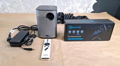 (1) XGIMI Halo+ 1080P Portable Projector W/ AC Adapter & Remote & (1) Eivotor Professional Microphone