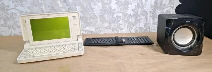 (1) iLive Bluetooth Speaker, (1) Vintage Tandy 1110HD Notebook Computer, W/O AC Adapter & (1) USB Keyboard