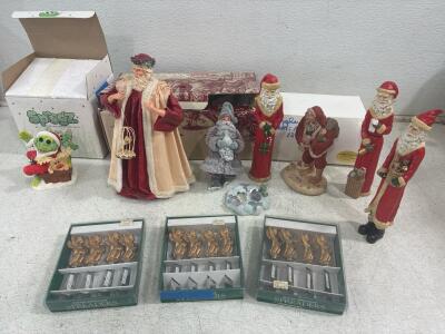 (7)Christmas Statues and (12) Stainless Steel Charib Spreaders