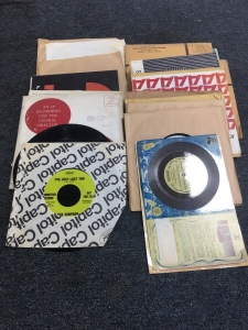 Assorted Vinyl Records and Sample Records