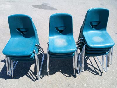 Set of 12 Stackable Teal Classroom Chairs with Chrome Frames and Vented Backs