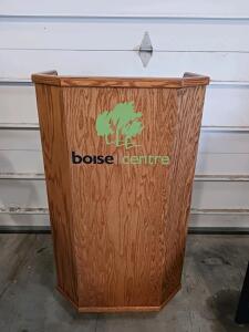 Wooden Standing Podium with Casters, Two Shelves, and Boise Centre Branding