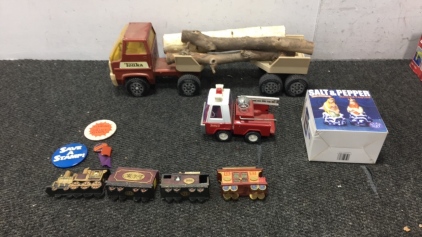 Vintage Tonka Truck, Vintage Buddy L Firetruck, (4) Vintage 1998 Toy Trains, (1) Salt and Pepper Mermaid/Neptune Shakers