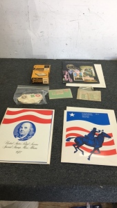 (3) Mint postage Stamp Commemorative Sets (3) Packs of Vintage Stamps (1) Columbia’s Art Works 1959 Calendar