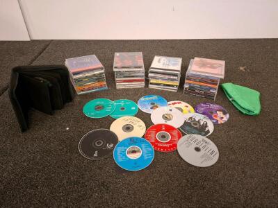Mixed Lot: 40+ Music CDs, DVDs, Storage Wallet &ndash; Rock, Pop, Hip-Hop, Holiday, Children&rsquo;s Albums