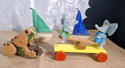 (2) Vintage Handcrafted Wooden Animal Pull Toys, (1) Frog & (1) Elephants On See Saw & (2) Vintage Handcrafted Wooden Sailboats