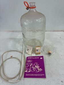 Wine makers Kit, (1) 5 gallon carboy, air seal, yeast nutrients, siphon, pectin Enzymes. And recipe book