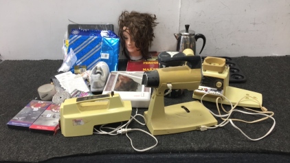 (3) Different Electric Mixers, (2) Perogie Makers, (1) Conair Mirror, (1) Martini Glass