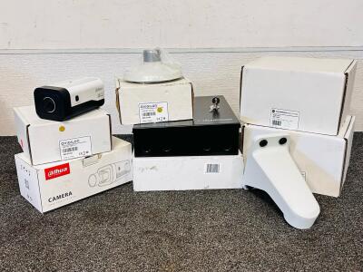 Dahua Technology IP Camera, Keri Systems Access Control Systems Lock Box( With Keys), (2) Avigilon indoor and outdoor pendant NPT adapters, and (2) Motorola Solutions Mount Pendant Arms