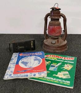 Kodak Six-20 Folding Hawk-Eye Camera, 1933&ndash;1934, x2 stamp books with some stamps collected, vintage lantern.