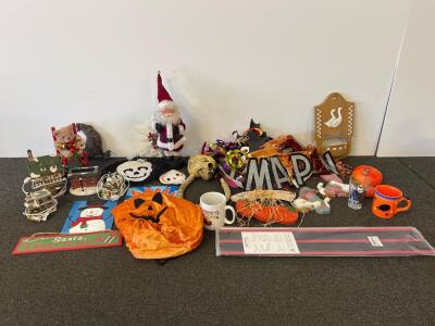 Lighted Christmas Village, Collectible Mugs, Kick Plate, And Halloween Decor