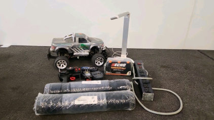 (1) Ford F-150 RC Monster Truck, Dual Motors, 1/10 Scale, Controller, Battery, Charger ( Can't Test) (6) Bottles Echo 2-Stroke Oil And More