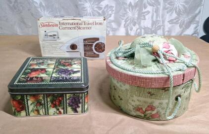 (1) Sewing Basket & (1) Decorative Tin, Both W/ Assorted Sewing Tools & Supplies & (1) Sunbeam International Travel Iron / Garment Steamer