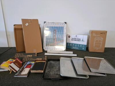 Large mixed lot, wall art, new in boxes Amazon returns. Cookie sheets, baby bath wheel barrow wheels and more