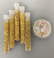 (5) Bottles of Flake Gold/Leaf Gold and Daisy Duck Collectible Coin