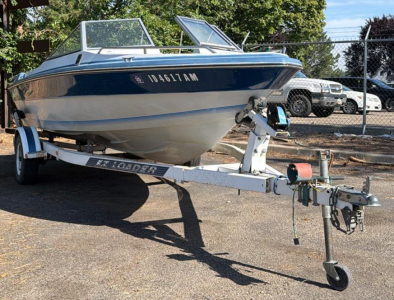 1990 BLUE RIVER BOAT AND TRAILER -
