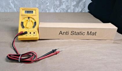(1) Caterpillar 6V7070 Digital Multimeter W/ Probes & (1) Static Mat