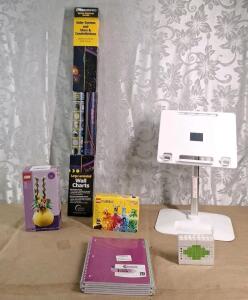 (2) Lego Sets, 1-Flower Vase & 1-Character Pack, (1) 2-Piece Space Explorer Series Wall Chart Set, (1) Laptop / Tablet Stand, (1) 6-Pack Of 70-Page Subject Notebooks & (1) lego Block Style Perpetual Calandar