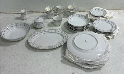 (35 piece) Heather Fine China of Japan. including, (7) Tea Cups,(18) plates of various sizes, serving bowl platter and table storage container. See photo for more details.