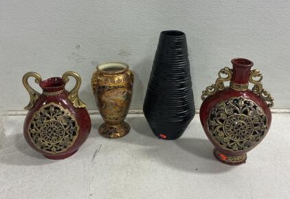 Decorative Ceramic Vase (2) red with carved bases, ceramic and with a gilded and floral design, and a black ceramic vase perfect for flowers.