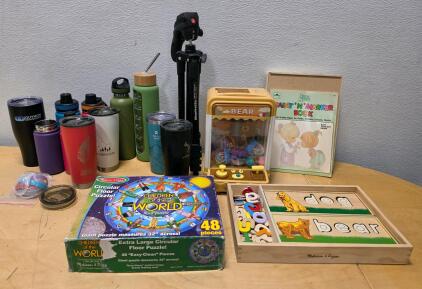 Manfrotto Tripod, Melissa & Doug Puzzles, 9 Tumblers, Bear Toy Claw Machine, Art Book