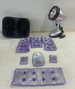 BODY COMFORT re setable heating packs , Including neck warmer, hand warmer, heating pad and pad with loop. (5total) Black silicone skull mould, Dorcy Spot Light with car charger ( untested)