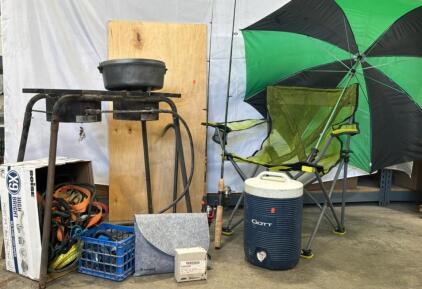 Large #12 Cast Iron Dutch Oven with Camping Gear Lot: Chair, Cooler, Fishing Rods