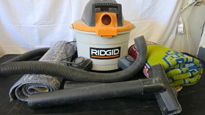 Wet / Dry vac with Hose attachments and shop rugs