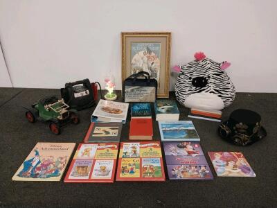 Assortment Of Books, Squishmallow Stuffed Animal, Jump Starter, Home Decor, And More