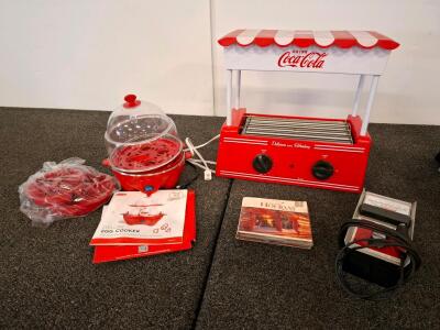 Dash Deluxe Egg Cooker, Coca-Cola Hot Dog Roller, Penske Tachometer, Holiday CD Set