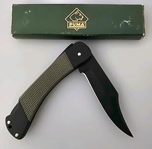 Puma 230365 Folding Pocket Knife, 2.8" Blade, Black-Coated Clip Point, Textured ABS Handle
