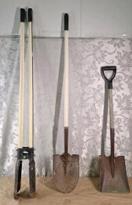 (1) Fiberglass Handled Post Hole Digger, (1) Fiberglass Handled Round Nosed Shovel & (1) Wood Handled Flat Nosed Shovel