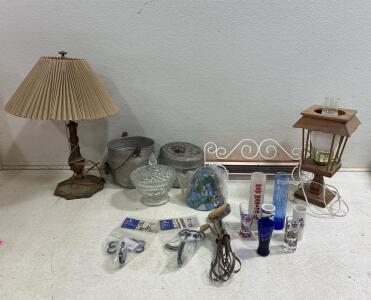 (2) antique table lamps, Antique metal mess kit, glass table jar, wall shelf, collection of tall shot glasses. Wall shelf. dog themed hanging hooks. Antique hand mixer and stained glass lamp shade.