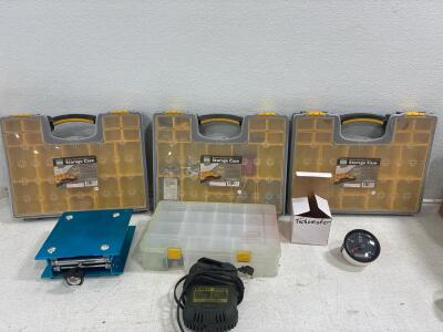 DeWalt 12v/20v max lithium Ion Charger(3) Storage case contain 20 bins portable parts. Some hardware pieces still included, 85mm digital tachometer designed for diesel engines, Lab jack stand with a blue aluminum platform. Plano 15 bin plastic storage ca