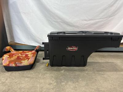 Under Cover SWING CASE. in original box. (Key and hardware in case.)HARMONY child blooster seat.
