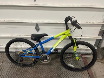 Nishiki Pueblo 24" Youth Mountain Bike, 21-Speed Shimano, Front Suspension, Blue/Yellow