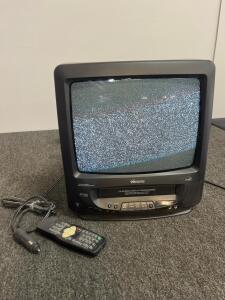 Memorex MVT2137 13-Inch CRT TV/VCR Combo, AC/DC, Remote, Car Adapter, NTSC, Model Year ~2003, turns on, switches chanels, and ejects VHS