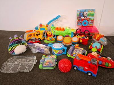 Assorted Toddler & Preschool Toy Lot &ndash; Includes Mickey Mouse Piano, Blippi Fire Truck, VTech Storybook, plays music.