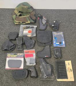Mixed Holster Lot: Safariland, Hogue AK Grip, Uncle Mike's, DeSantis, CAA, Accessories