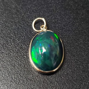 $800 10K Black Opal (Smoked)(2.4ct) Pendant