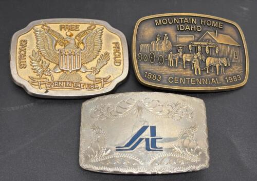 Patriotic and Historical Belt Buckle Lot &ndash; USA Eagle &ldquo;Born in the USA&rdquo;, 1983 Idaho Centennial, Engraved AC