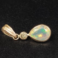 $1000 14K Opal(0.8ct) Diamond(0.15ct) Pendant