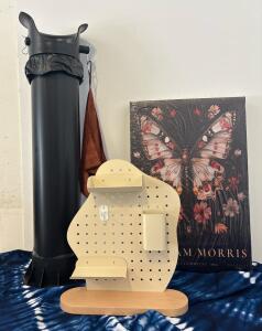 Coffee Shop Lot: 3 Piece Floral Insect Canvases, (1) Cpffee Grounds Trash Stand with Bags And (1) Display Shelf.