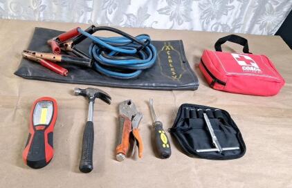 (1) Pair Of Jumper Cables, (1) Portable Worklight, (1) First Aid Kit & Assorted Hand Tools